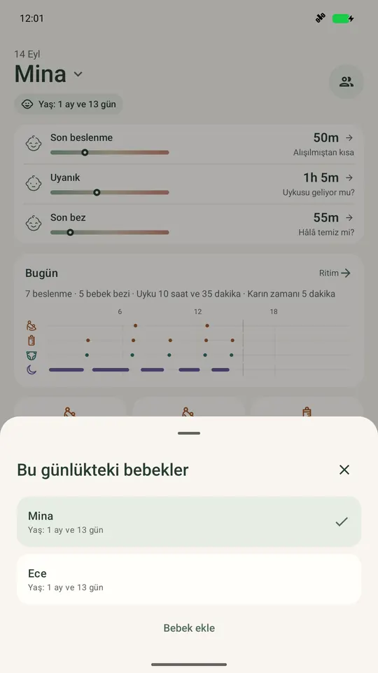 Ella’nın bebek seçicisi, seçili bebeğin Bugün ekranının üstünde iki bebeği listeler.